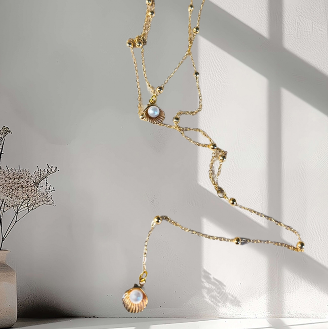 Sautoir double coquillage