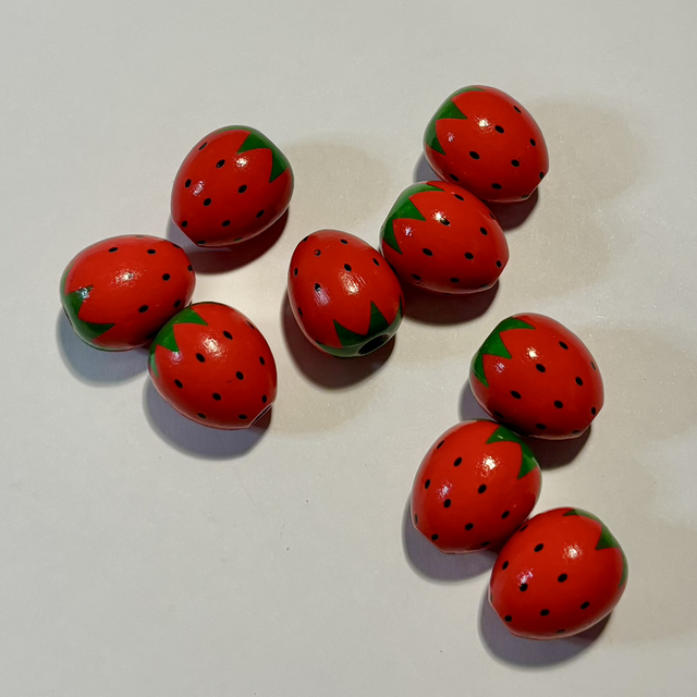 E- 4 large wooden painted strawberry beads