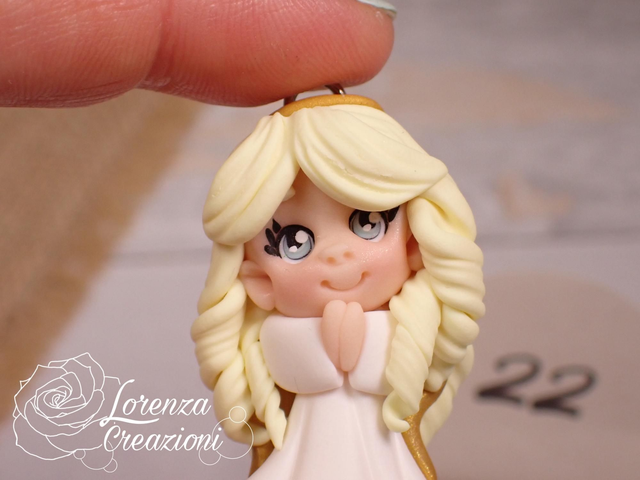 Angioletto custode tascabile n.22
Portachiavi o charm, artigianale, pezzo unico. Modellato a mano argilla polimerica, made in Italy.