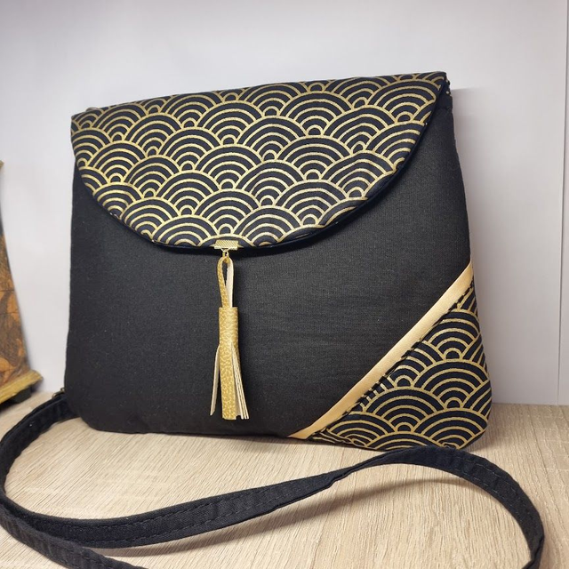 Sac pochette élégante &quot;Nami&quot; noir doré