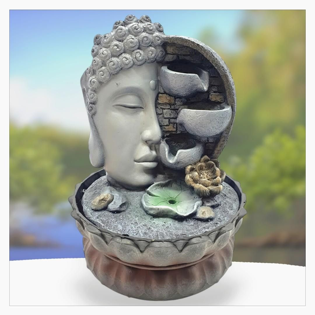 "Tête de Bouddha sur mur" - Fontaine en résine 29 cm 