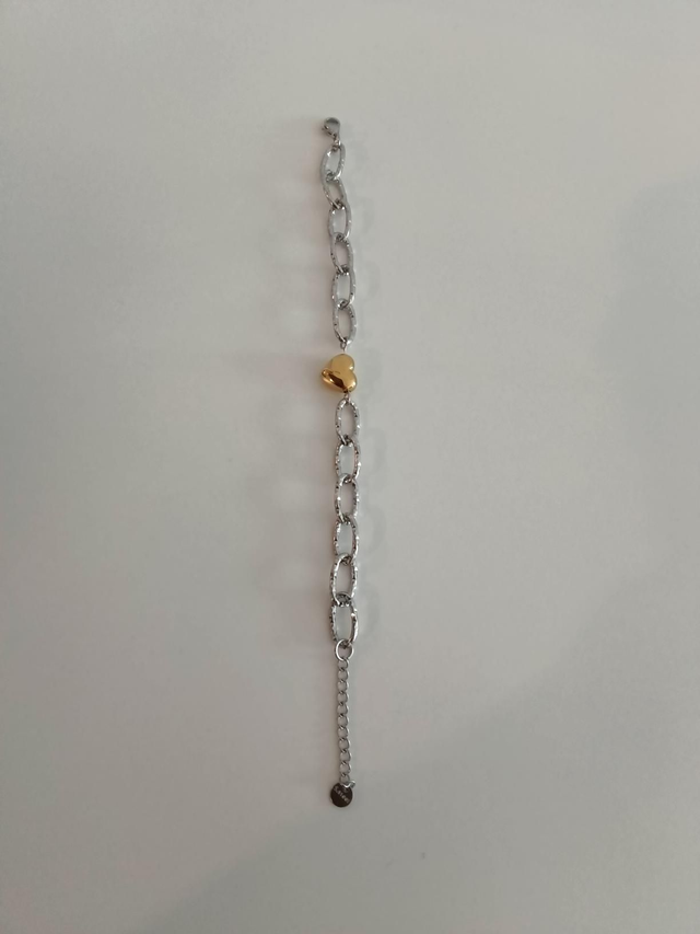 Zilverkleurig met goud hartje