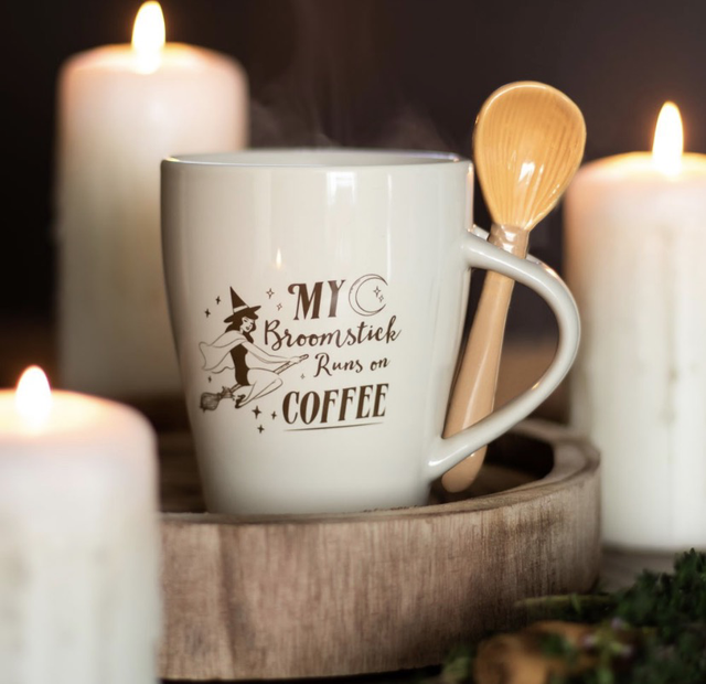 “My broomstick runs on coffee” mug