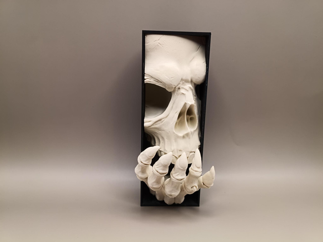 Creeping skeleton hand book nook