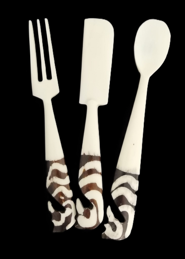 Hand carved cutlery set