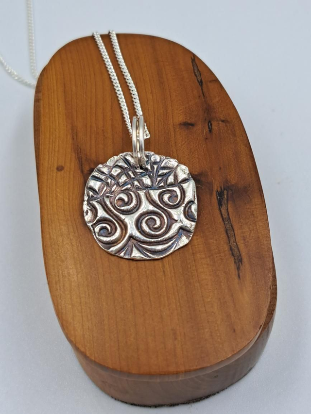 Circular Silver Pendant 