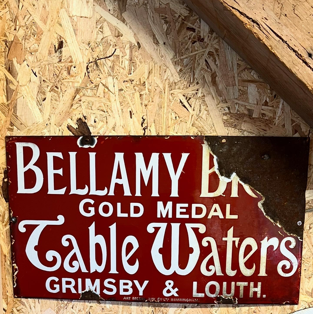 A Late 19th/ Early 20th Century Bellamy Bros Gold Medal Table Waters Enamel Advertising Sign