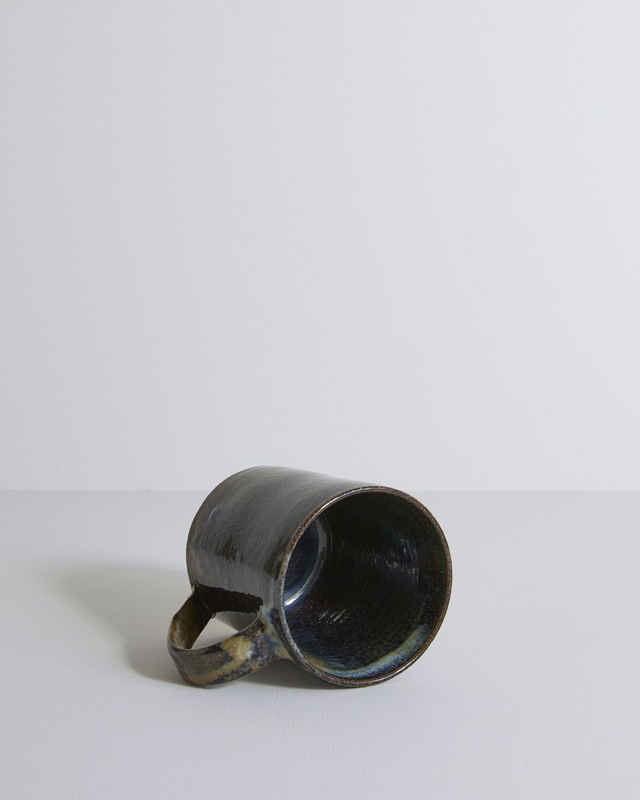 A single mug in blue mist