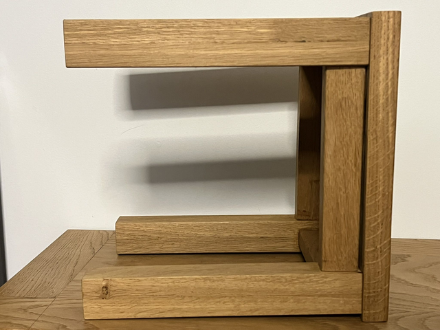 Two rustic low stools made of American Oak.