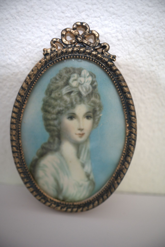 Cadre ovale italien en métal