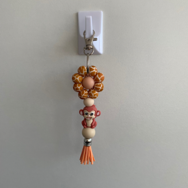 Aap bruin oranje, bloem 12mm kralen 