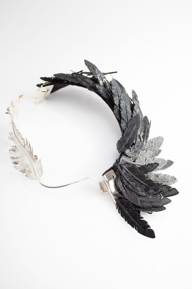 Incubo nero with feather