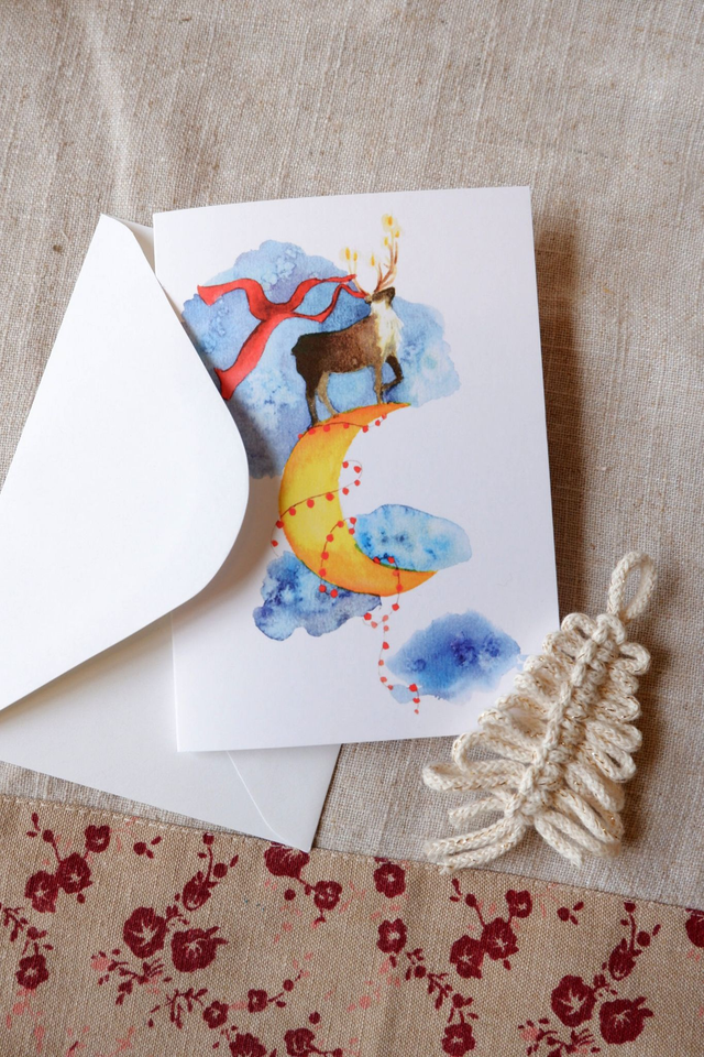 Carte de Noël/carte de voeux Le renne sur la Lune 