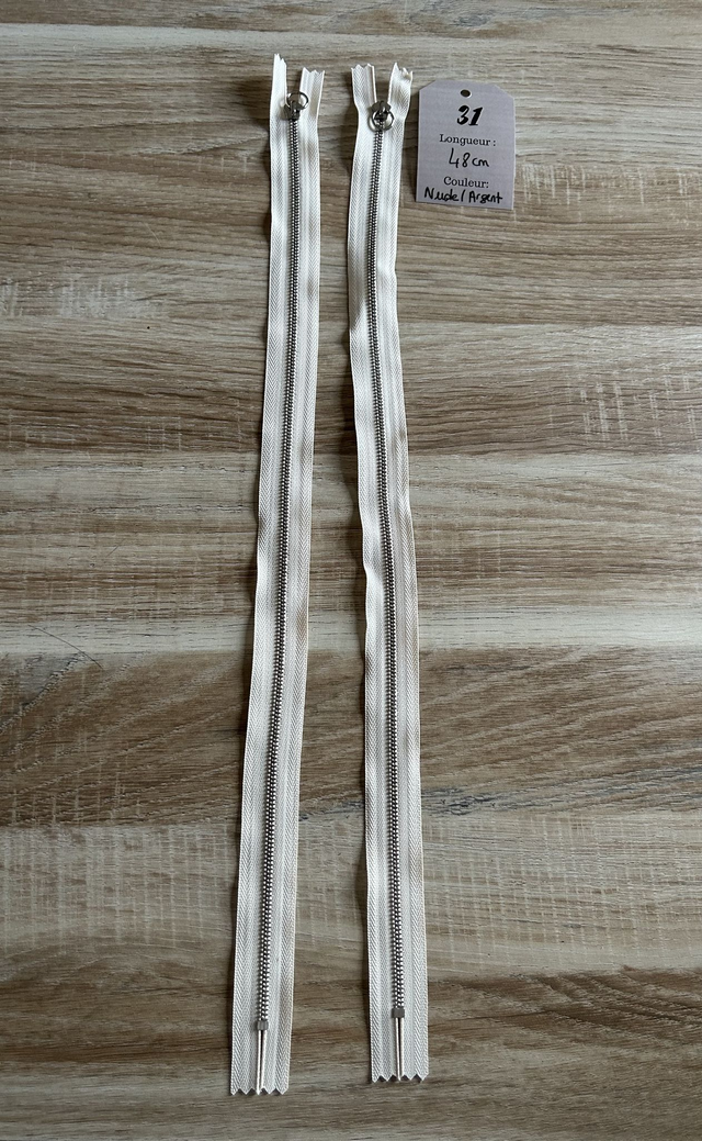 Fermetures éclair métallique nude 48cm