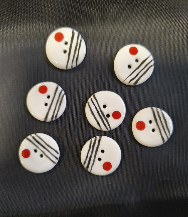 Boutons noir et rouge graphiques 