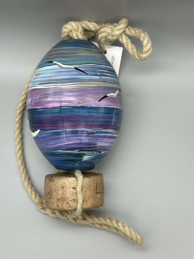 red boat purple skies