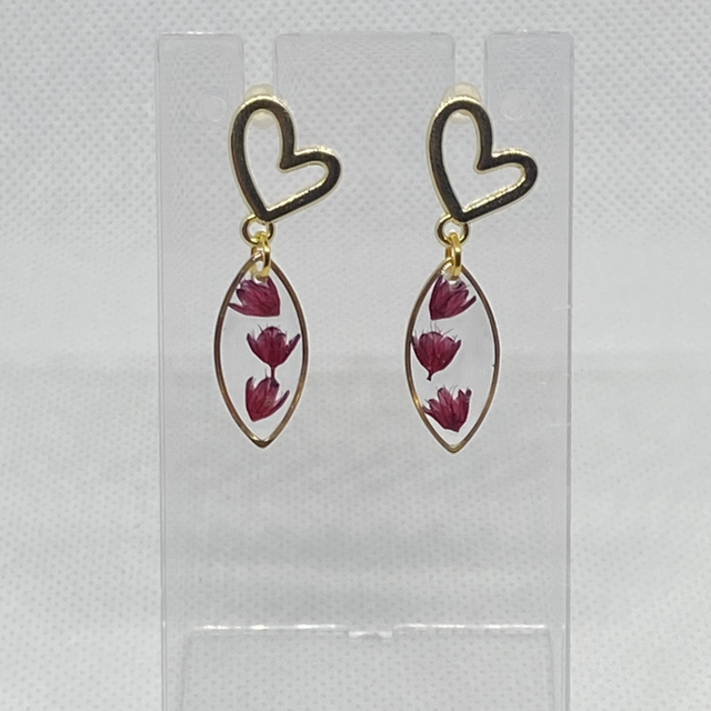 Gold coloured flower dangly earrings 