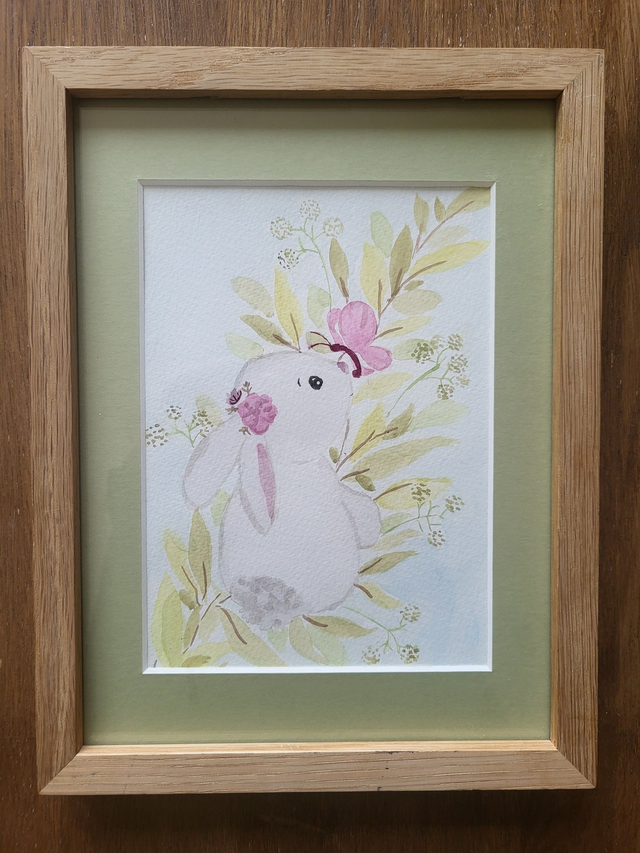 Le lapin et ses jolies fleurs