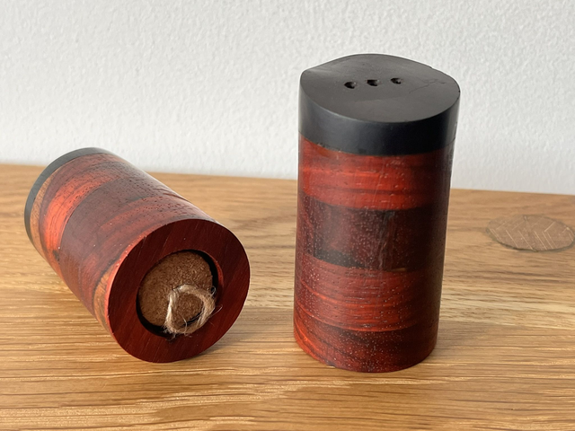 Hand crafted set of salt and pepper shakers, crafted from Hard Ebony and Padauk.