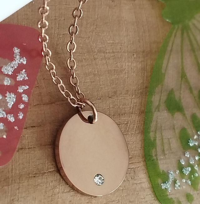 Collier disque rose