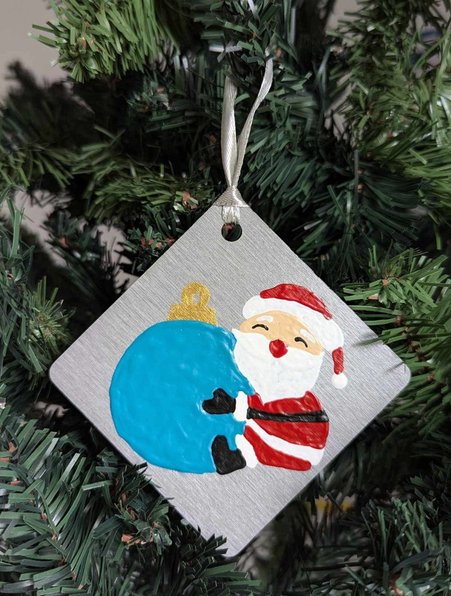 Père Noël et la sa boule de Noël