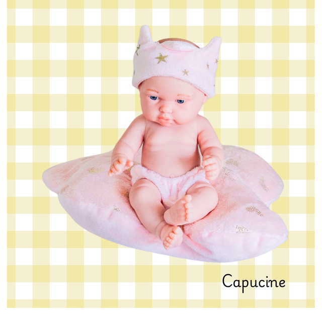 Poupée rêveuse rose