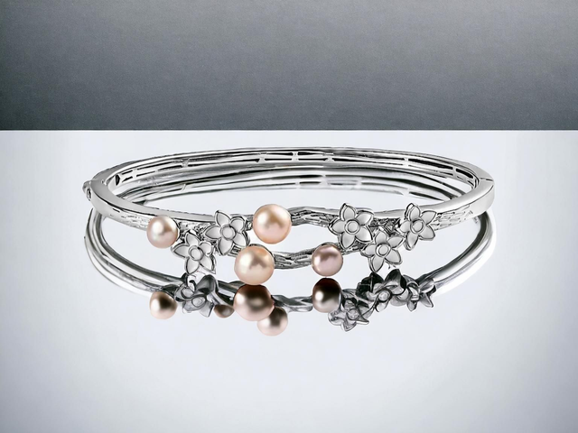 Natural Freshwater Pearls & Platinum Plated Bangle.