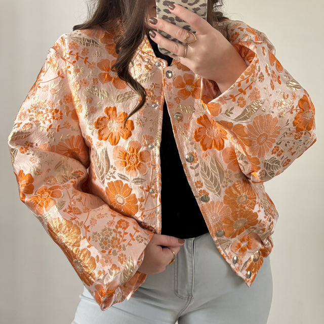 Bloemenprint jasje oranje 