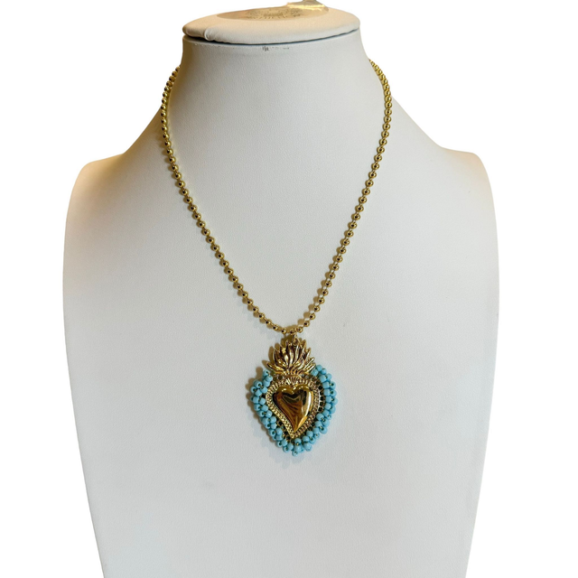 Cuore sacro e perline turchesi