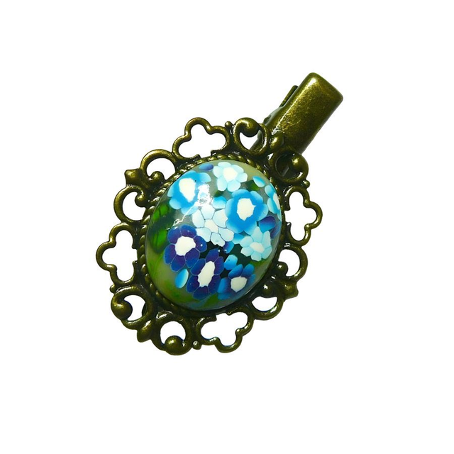 Pince croco épingle ovale rétro fleurs bleues