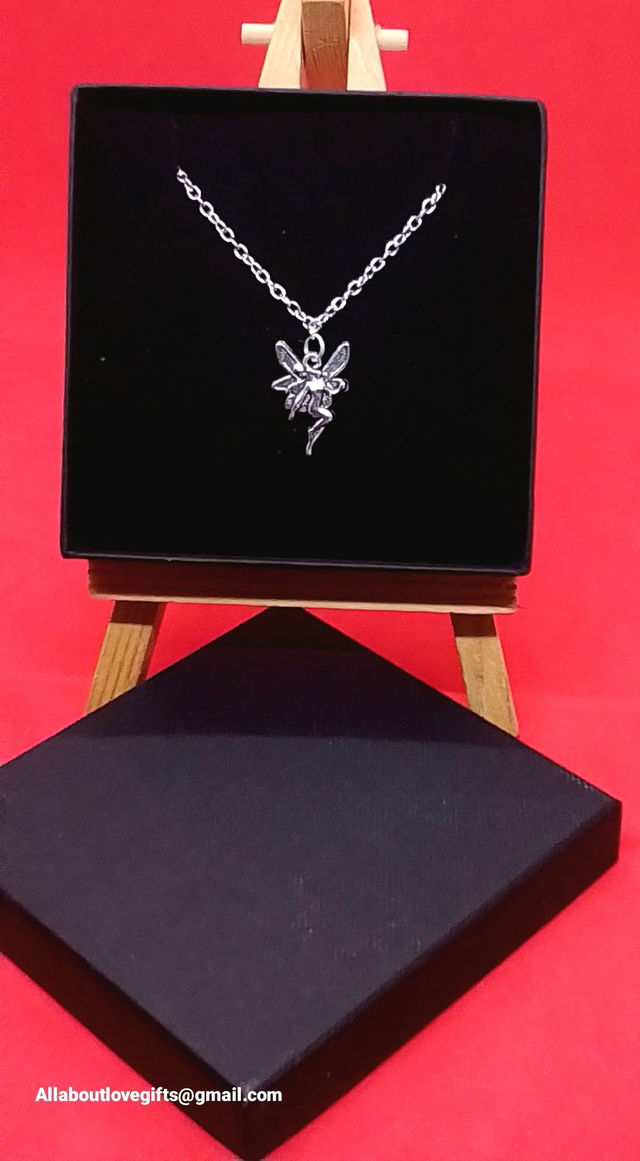 Bracelet Beautifully Hand Crafted with Exceptional Detail, Chain and Pixie Pendant.