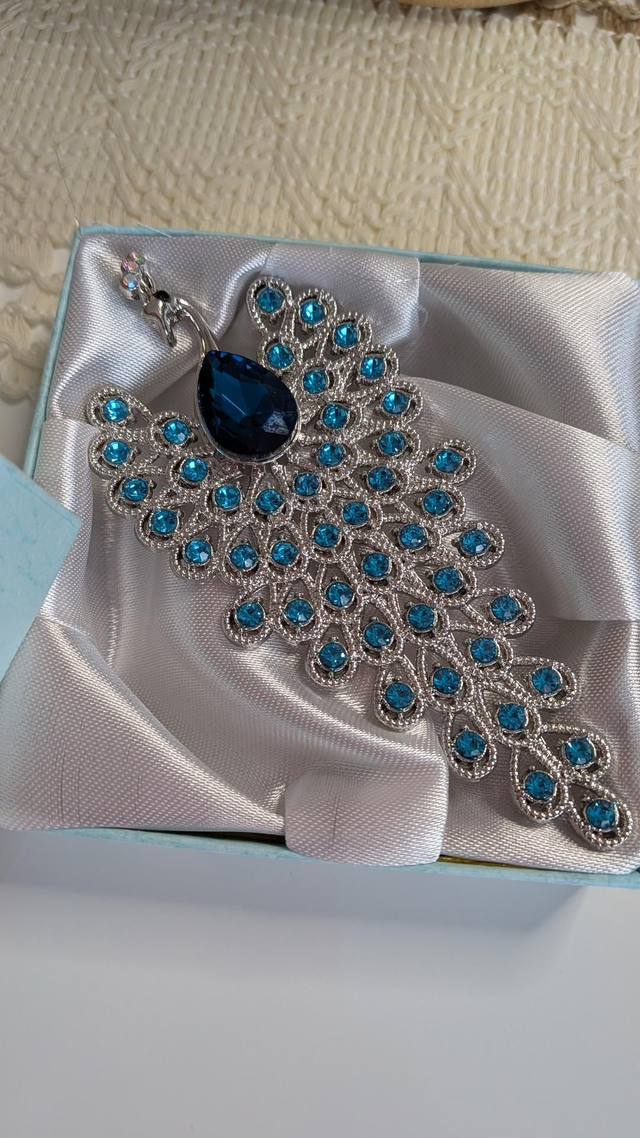 Peacock brooch 