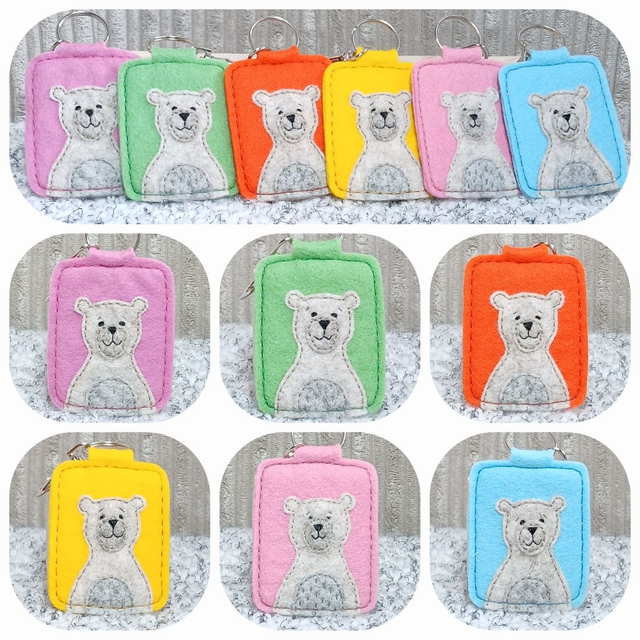 Bear Tag Key Rings. Cute bear design sewn onto one side. Hand-sewn. Available in different colours. Wool felt. Lobster swivel clasps. 