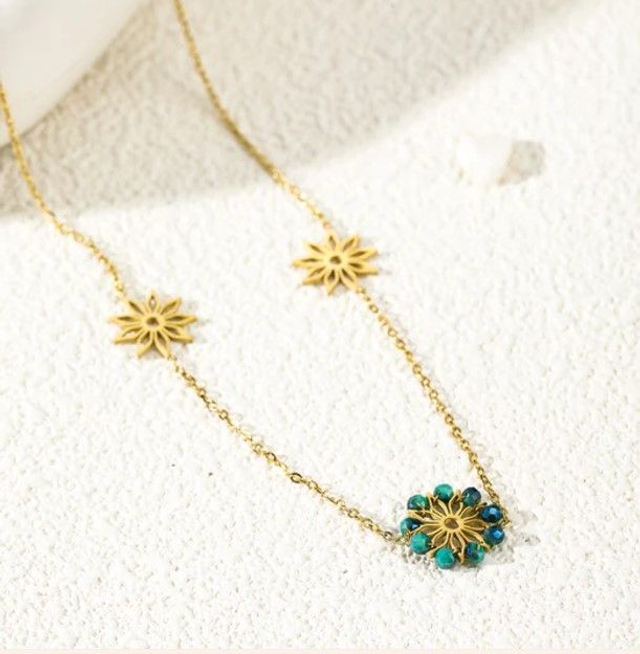Collier "Eclat" chaîne doré avec étoile et pierres bleues en acier inoxydable