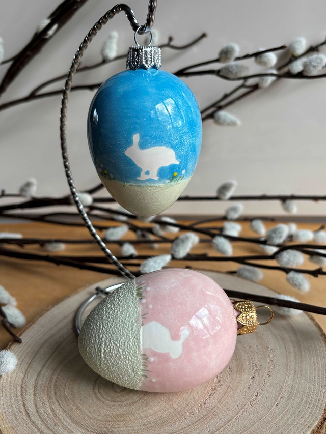 7cm Handmade Egg showing Two Hares - choice of blue or pink