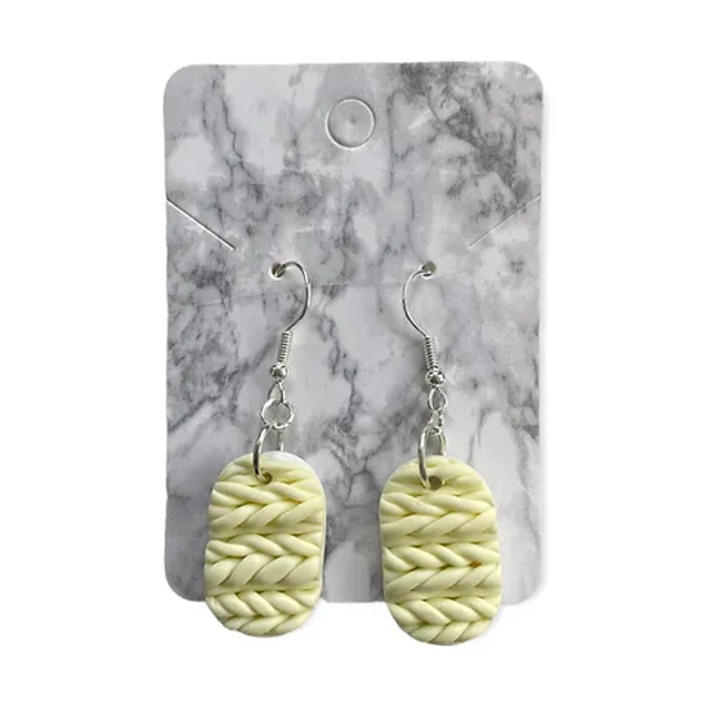 Cream knitted earrings