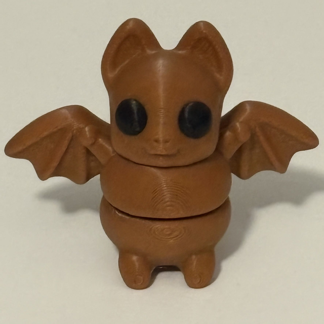 3D Printed Bat Brown With Black Eyes