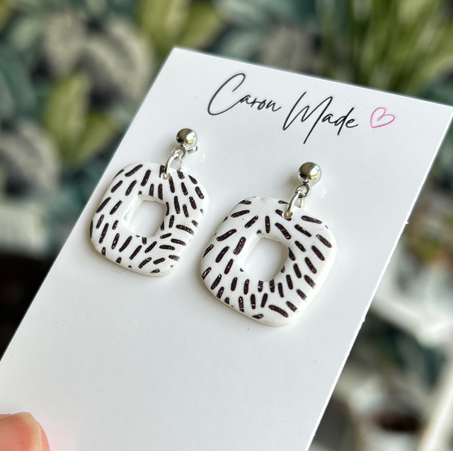 Black and white rounded square earrings