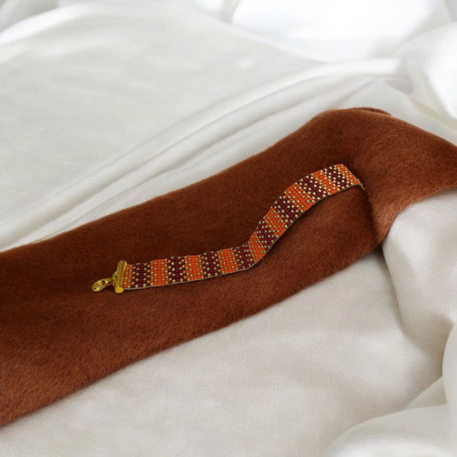 Bracelet rouge, orange et or