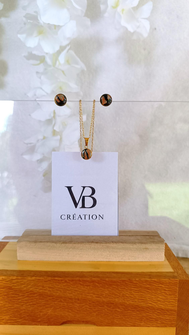 Parure collier et puces marbrées noires oranges