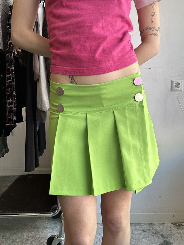 green mini skirt
