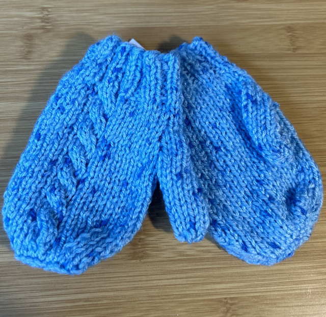 7037. Babies mitts..