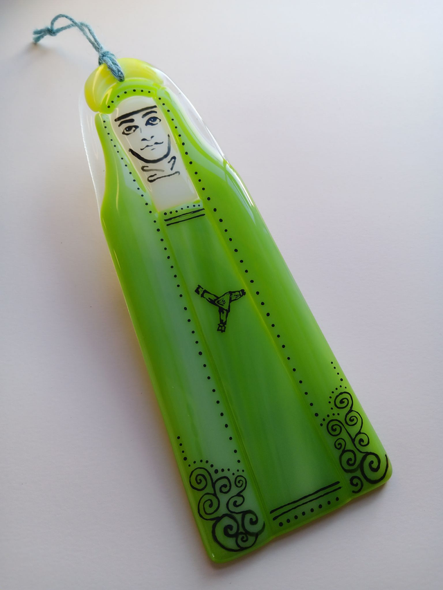 Painted and fused glass St. Brigid figure