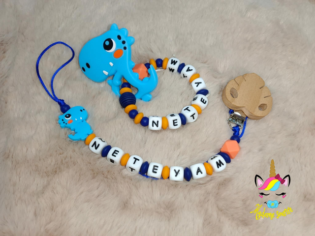 1 Attache tétine + 1 Hochet Dinosaure