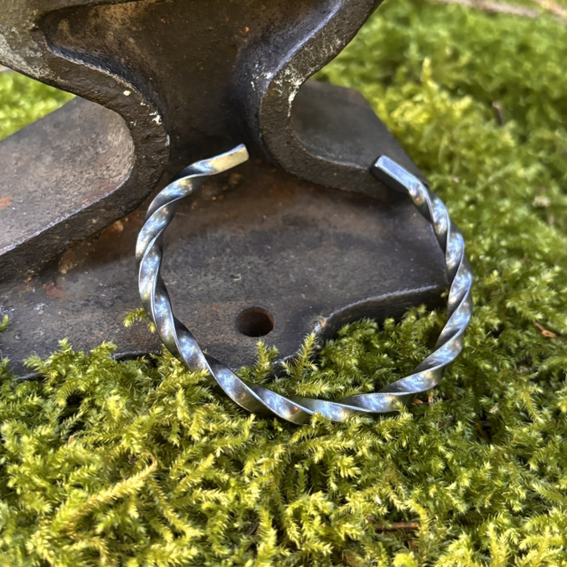 Manchette torsade homme  