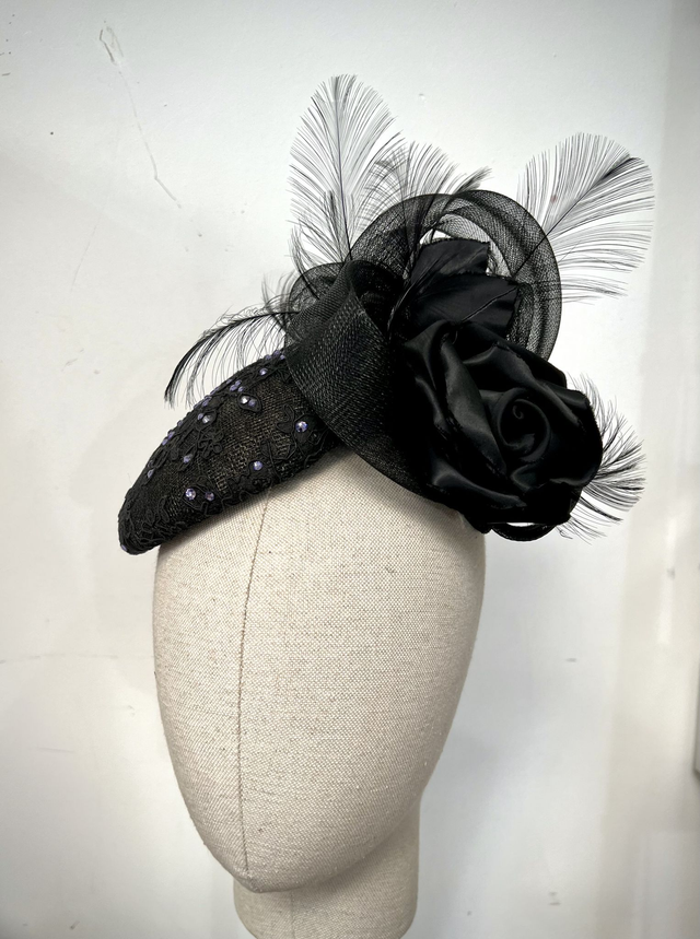 Black sinamay with lace, crinoline, feathers and Swaroski crystals