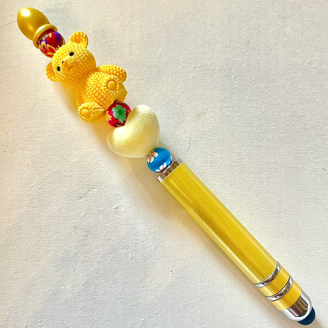 S51 - Stylo à perles et ours jaune
