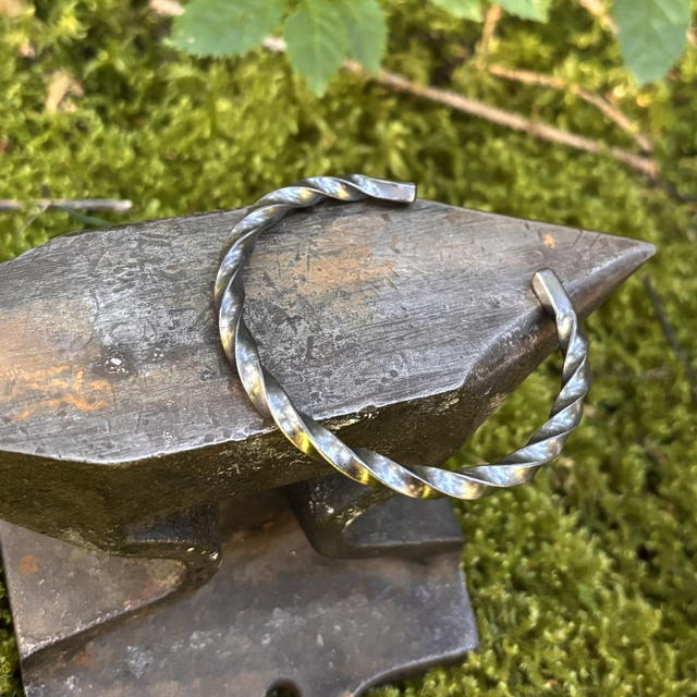 Manchette torsade homme