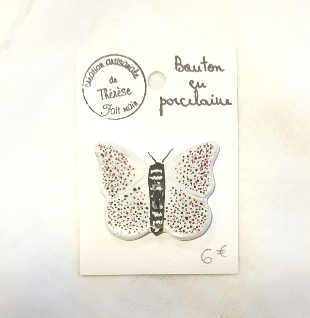 Bouton papillon noir et blanc 