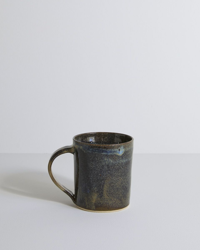 A single mug in blue mist